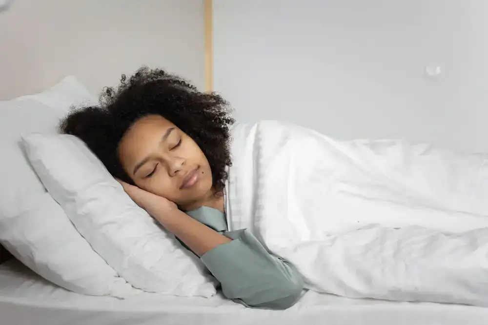 Person sleeping peacefully on a supportive mattress
